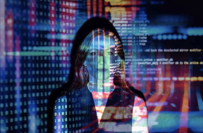 Professional working at a computer reviewing digital information